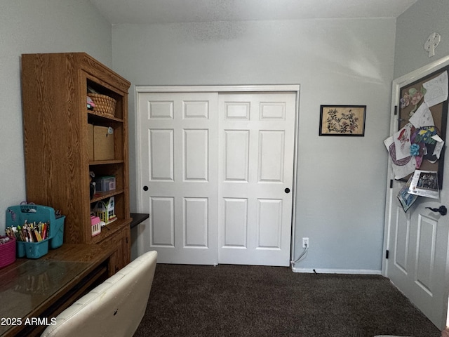 bedroom with carpet flooring and a closet