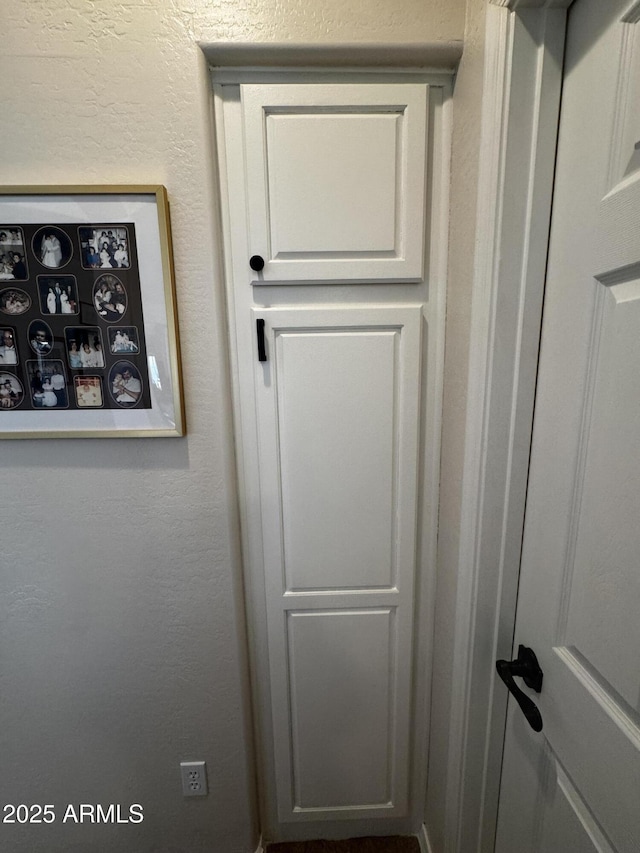 interior details with a textured wall