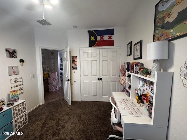 office with baseboards, dark colored carpet, and visible vents