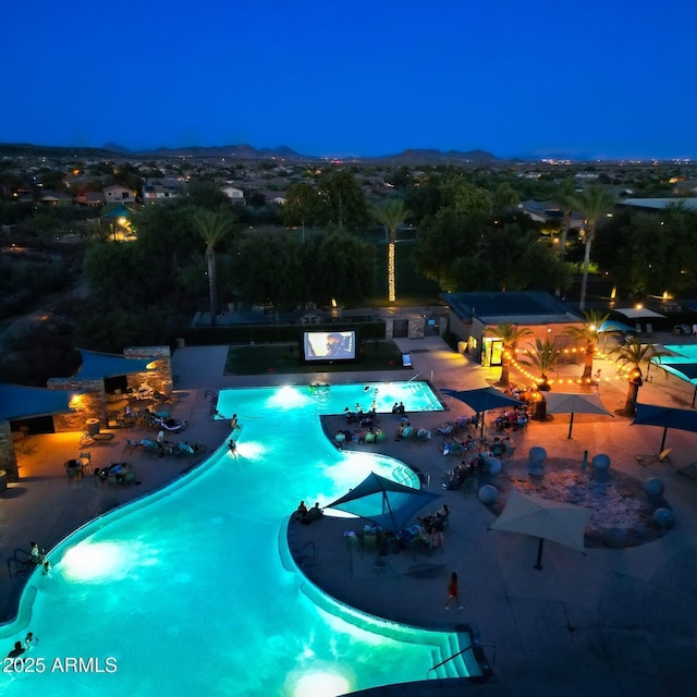 pool with a patio