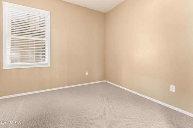 view of carpeted spare room