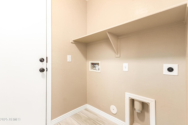 clothes washing area with gas dryer hookup, washer hookup, and hookup for an electric dryer