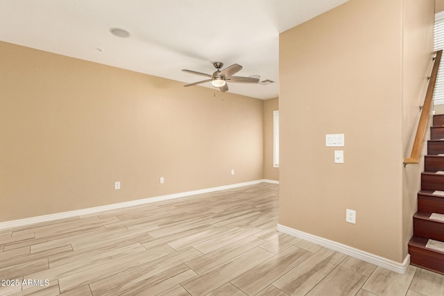 unfurnished room with ceiling fan and plenty of natural light