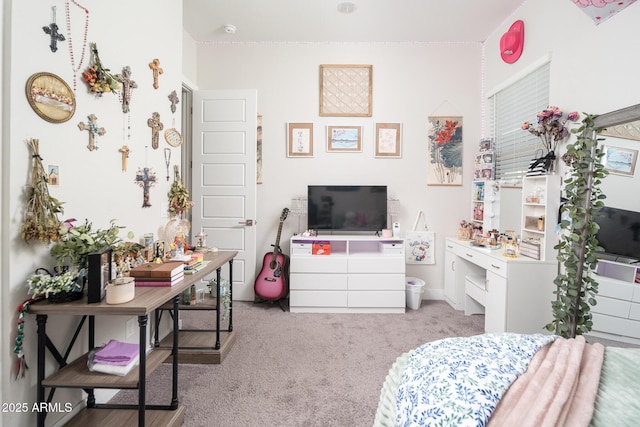 bedroom featuring light carpet