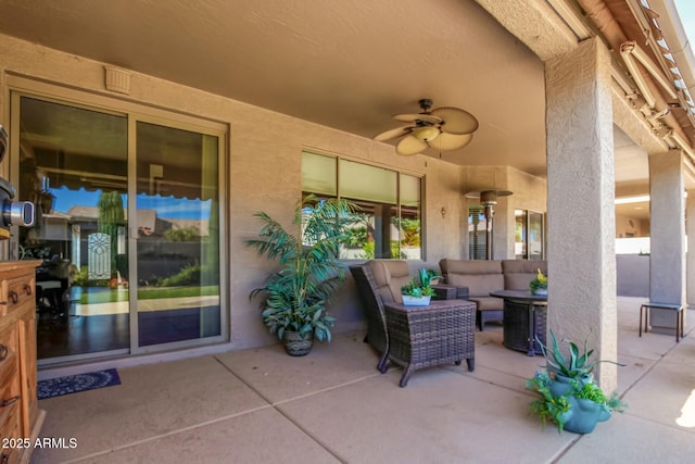 view of patio featuring ceiling fan and an outdoor hangout area