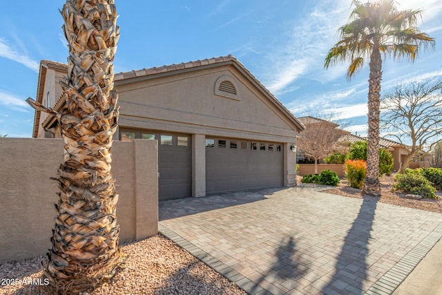 garage with fence