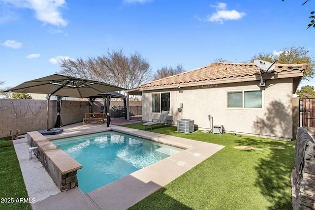 view of swimming pool with a gazebo, central AC, a patio, and a lawn