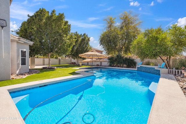 view of pool with a yard, a fenced backyard, and a fenced in pool