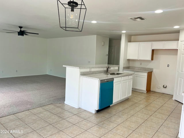 kitchen with sink, a center island with sink, light carpet, dishwasher, and white cabinets