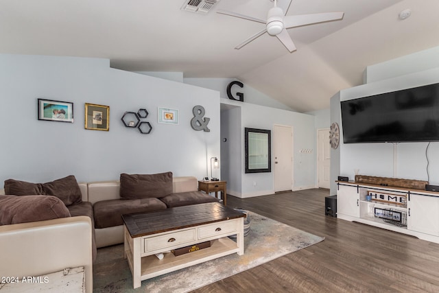 living room featuring ceiling fan, dark hardwood / wood-style flooring, and vaulted ceiling