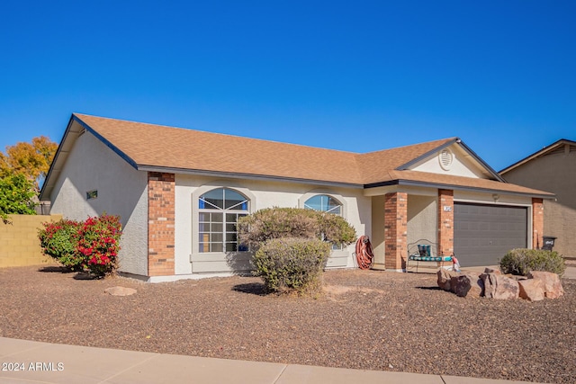 ranch-style house with a garage