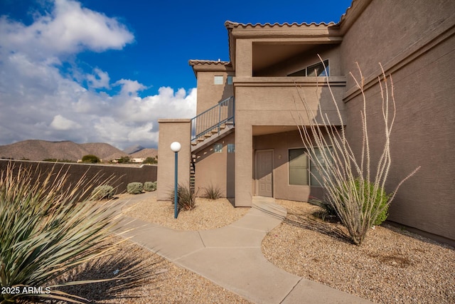 property entrance with a mountain view