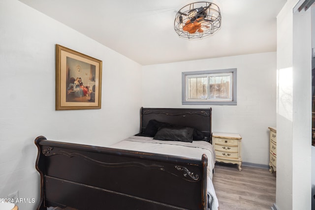 bedroom featuring wood-type flooring