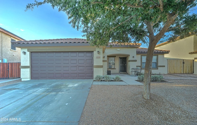 view of front of home with a garage