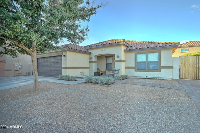 view of front of property featuring a garage