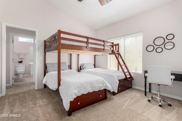 bedroom with ceiling fan, baseboards, vaulted ceiling, and light colored carpet