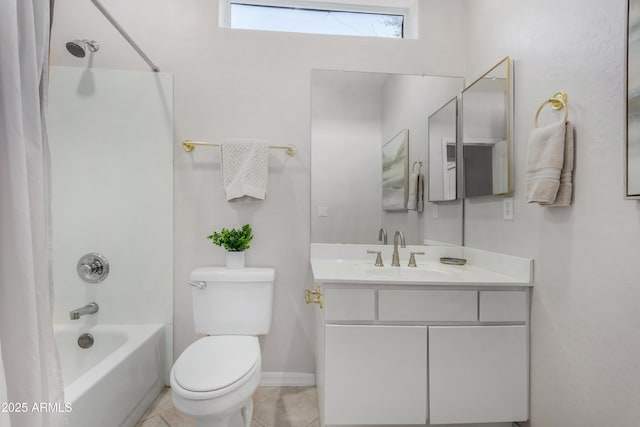 bathroom with baseboards, toilet, tile patterned flooring, shower / bath combo with shower curtain, and vanity