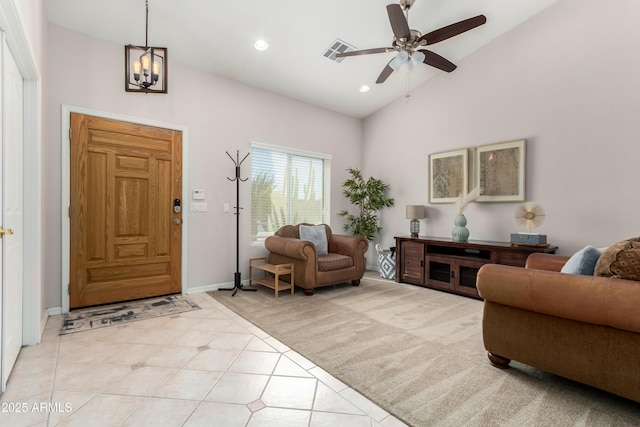 interior space with light tile patterned floors, high vaulted ceiling, recessed lighting, light colored carpet, and a ceiling fan