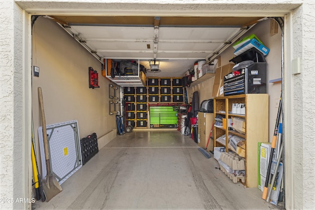 garage featuring a garage door opener