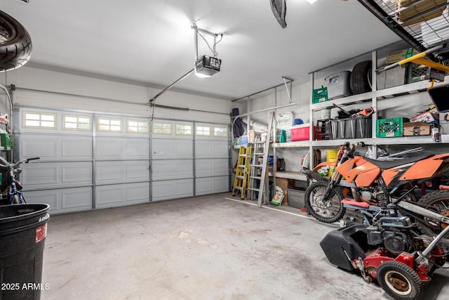 garage featuring a garage door opener