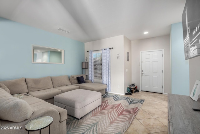 living area featuring recessed lighting, light tile patterned flooring, baseboards, and visible vents