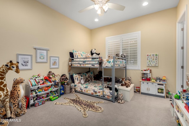 carpeted bedroom with ceiling fan and recessed lighting