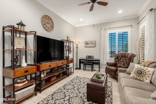 living room with crown molding, recessed lighting, a ceiling fan, wood finished floors, and baseboards