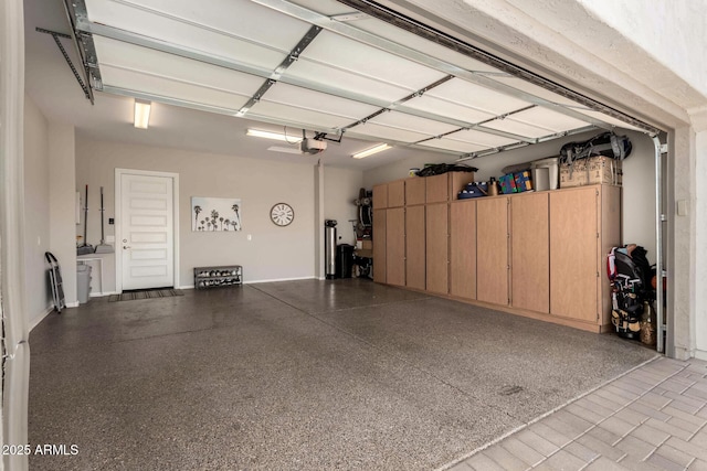 garage featuring a garage door opener