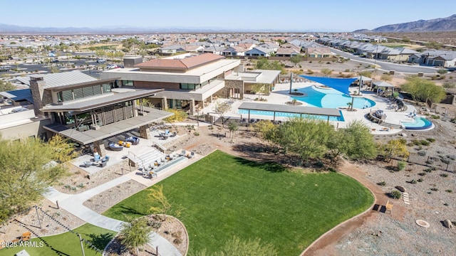 bird's eye view featuring a mountain view and a residential view