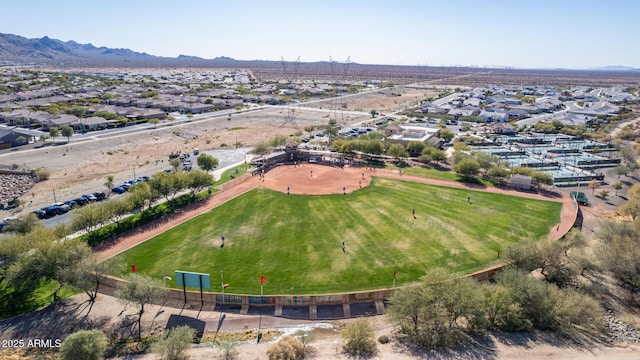 birds eye view of property with a residential view and a mountain view