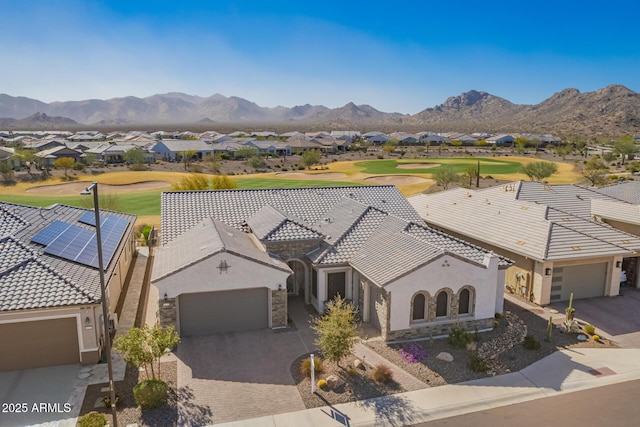 birds eye view of property with a mountain view, golf course view, and a residential view