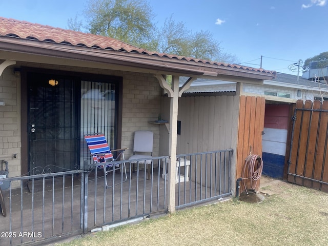 view of patio featuring fence