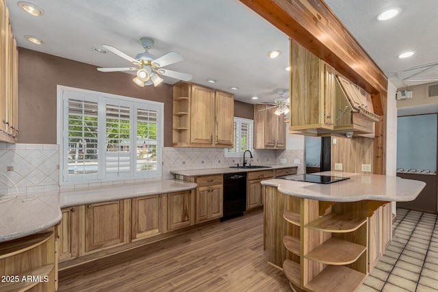 kitchen featuring open shelves, tasteful backsplash, black appliances, and a sink