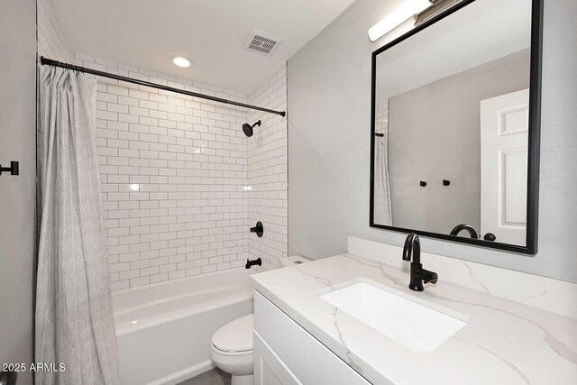 9355 N 91st St Unit 112, Scottsdale, AZ 85258 - bathroom featuring toilet, vanity, and shower / bathtub combination with curtain