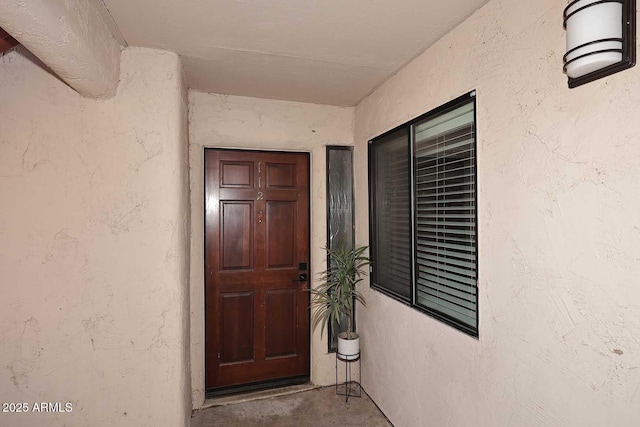 9355 N 91st St Unit 112, Scottsdale, AZ 85258 - view of exterior entry featuring stucco siding