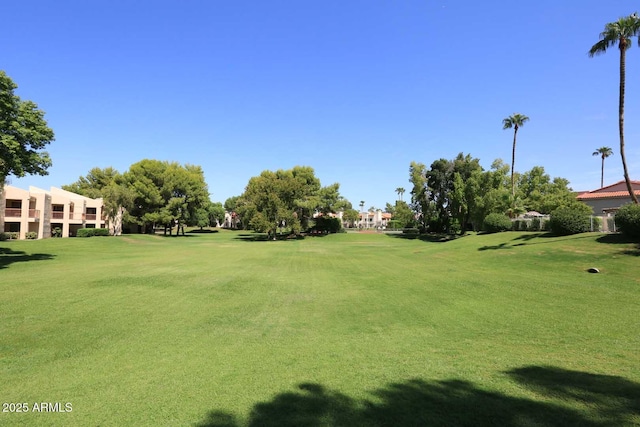 9355 N 91st St Unit 112, Scottsdale, AZ 85258 - view of property's community with golf course view and a yard
