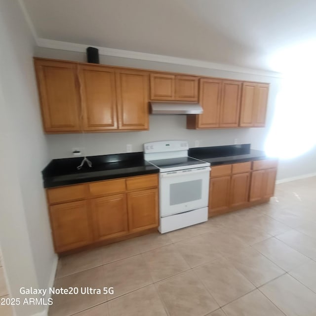 1829 E Adams St, Phoenix, AZ 85034 - kitchen featuring baseboards, under cabinet range hood, electric range, light tile patterned flooring, and dark countertops
