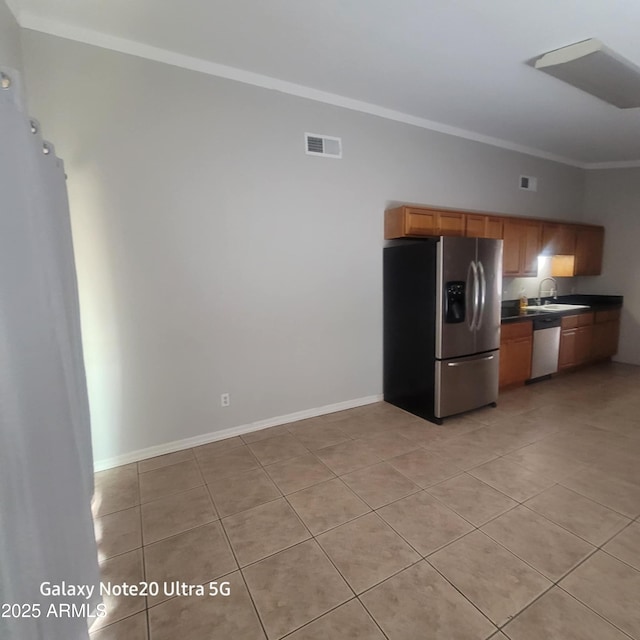 1829 E Adams St, Phoenix, AZ 85034 - kitchen featuring a sink, dark countertops, stainless steel appliances, visible vents, and ornamental molding