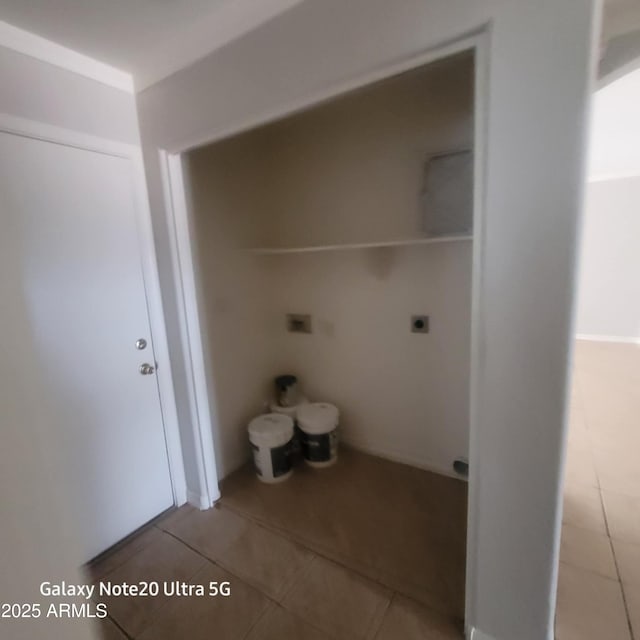 1829 E Adams St, Phoenix, AZ 85034 - laundry area featuring tile patterned floors, electric dryer hookup, and laundry area
