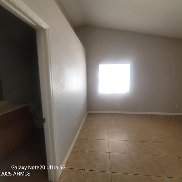 1829 E Adams St, Phoenix, AZ 85034 - tiled empty room with baseboards and vaulted ceiling