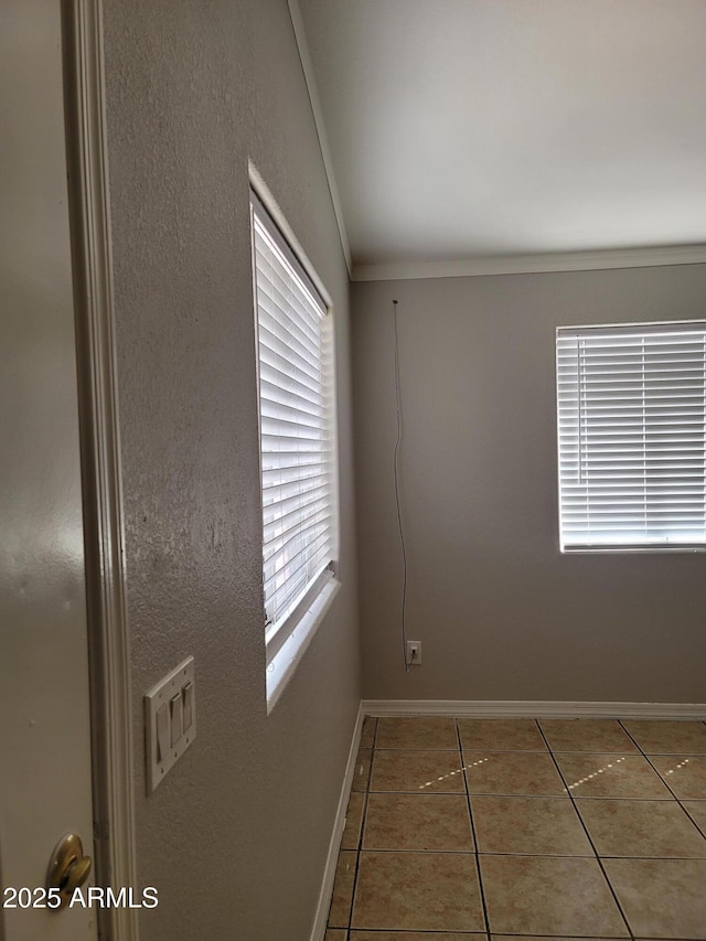 1829 E Adams St, Phoenix, AZ 85034 - spare room with tile patterned flooring, ornamental molding, and baseboards