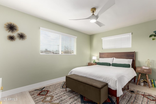 bedroom featuring ceiling fan and hardwood / wood-style floors