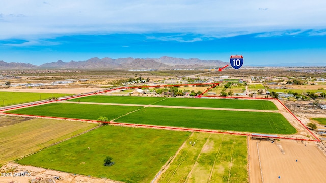 birds eye view of property with a mountain view