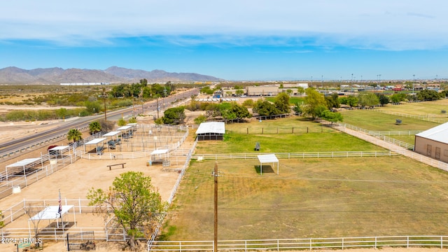 bird's eye view with a mountain view and a rural view