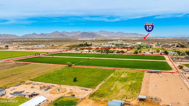 drone / aerial view featuring a mountain view