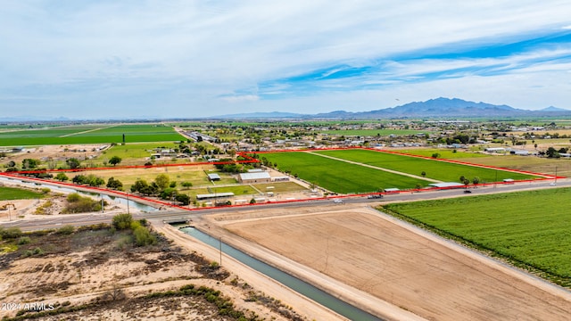 birds eye view of property with a mountain view