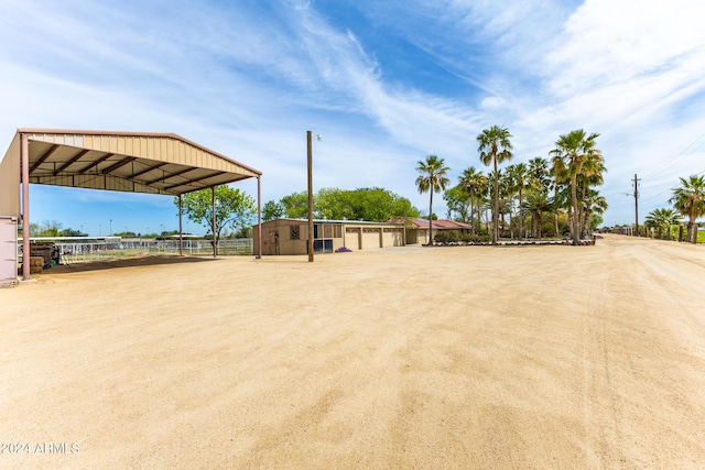 view of yard with a carport