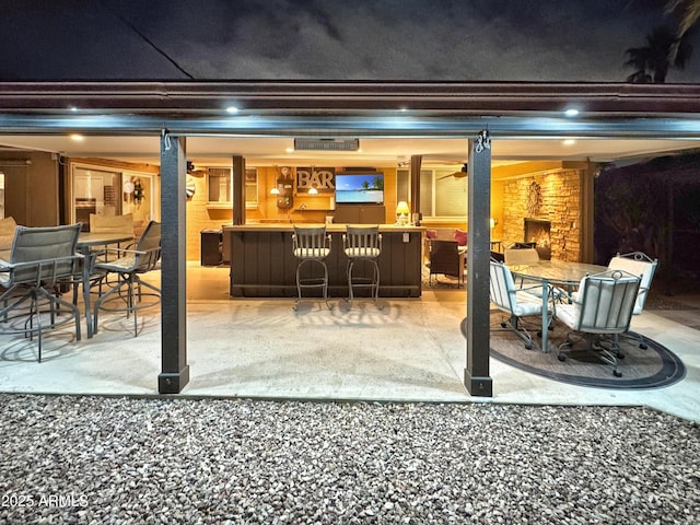 view of patio featuring outdoor dining area