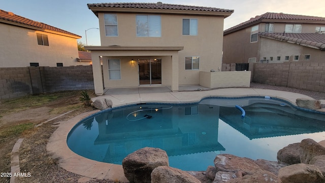 view of swimming pool featuring a patio