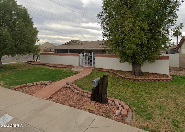 view of front facade featuring a front yard